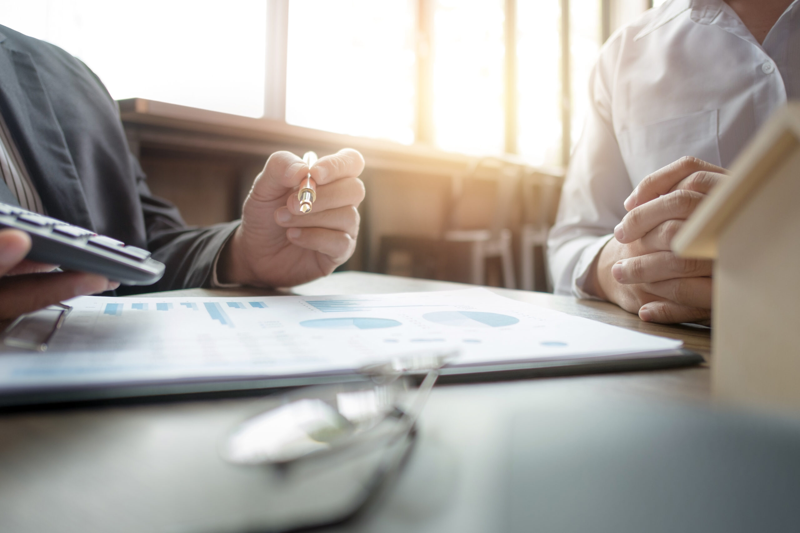 business people discussion about contract of real estate sale business succession planning