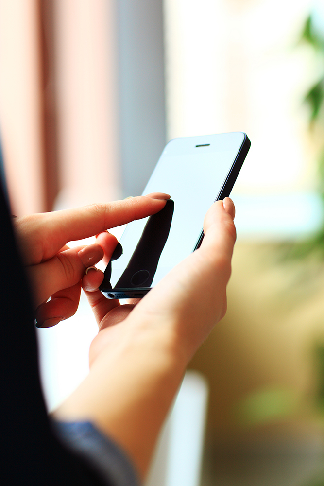 Businesswoman using smartphone